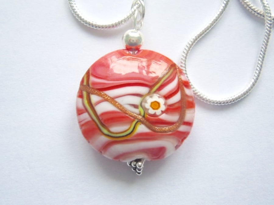 Pink Murano glass lentil pendant with sterling silver.