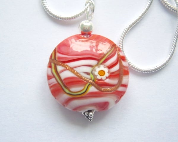 Pink Murano glass lentil pendant with sterling silver.