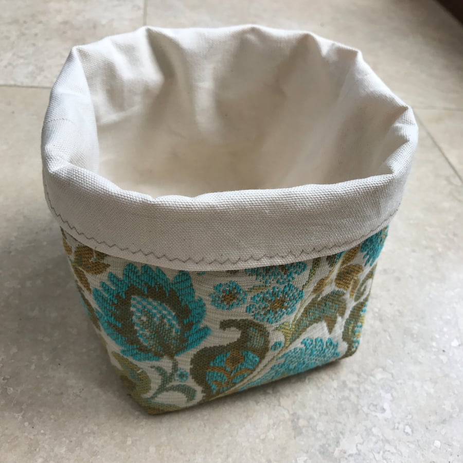 Fabric storage bin in vintage tapestry