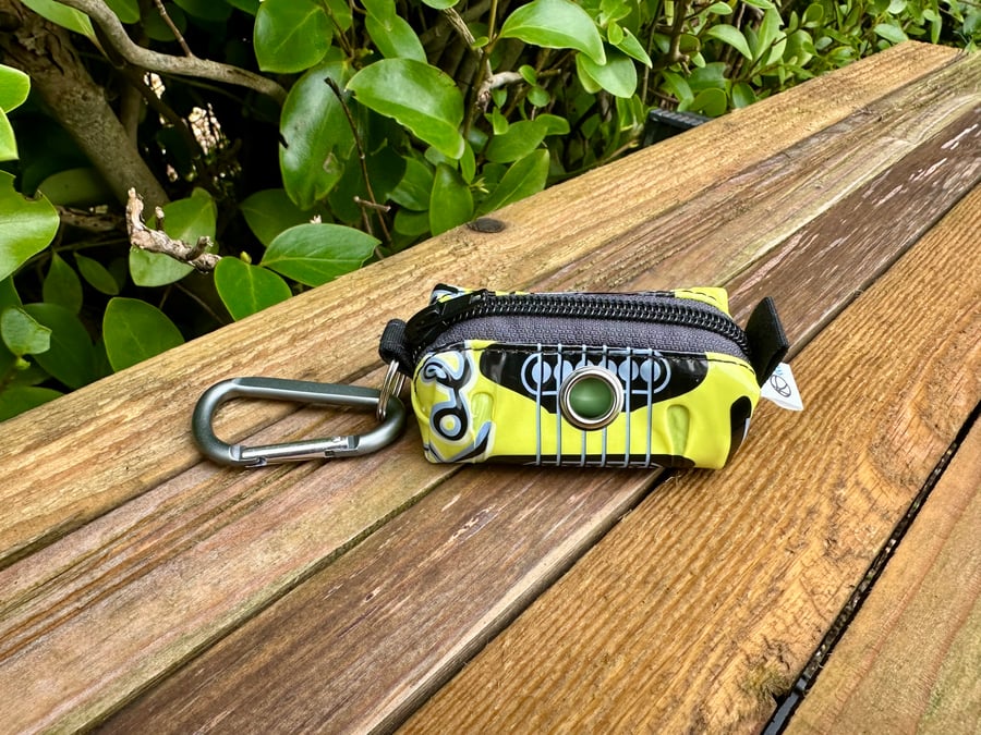 Dog Poo Bag Holder Made From Inflatable Guitar Toy