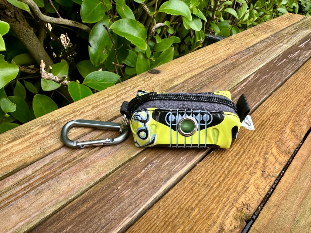 Dog Poo Bag Holder Made From Inflatable Guitar Toy