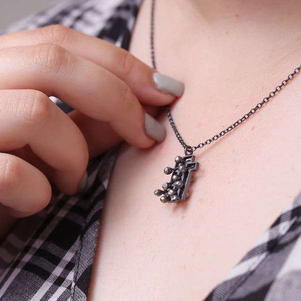 Silver necklace pendant fidget mindful jewellery style 1.