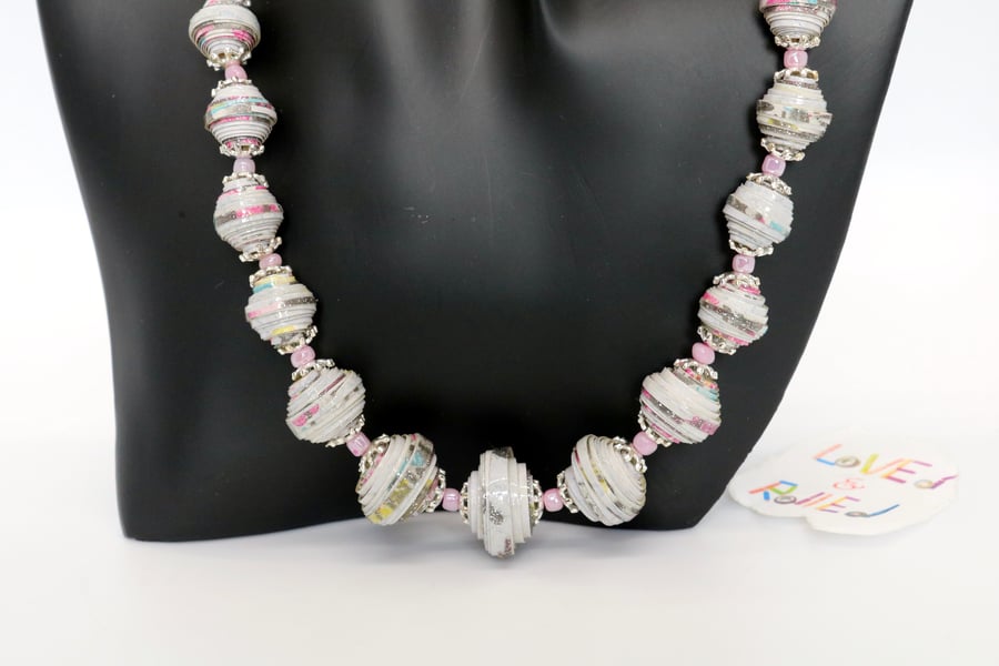 Sparkly necklace made with round paper beads of graded sizes