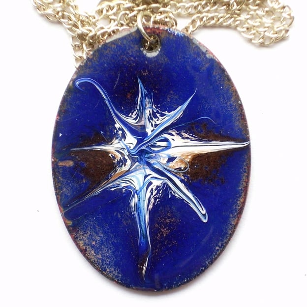 red-brown and white scrolled on blue over clear enamel - pendant