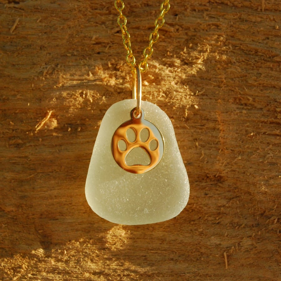 Sea glass pendant with golden paw charm - Folksy