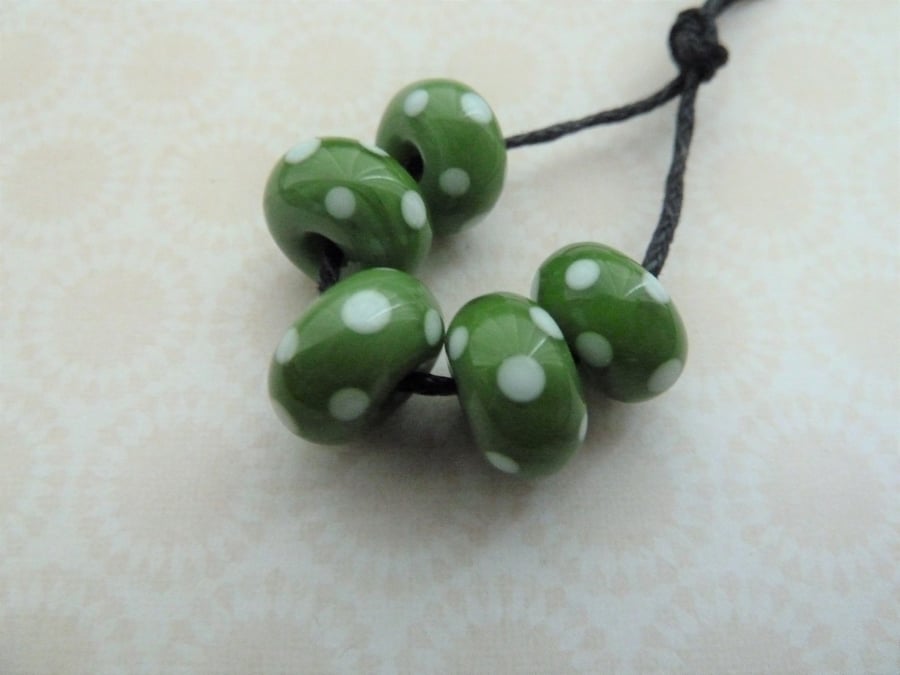 handmade lampwork green and white spot beads