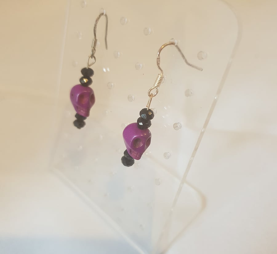 Purple skull earrings