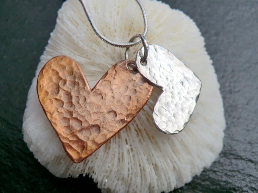Hammered sterling silver and copper, twin, heart necklace. The Amity pendant.