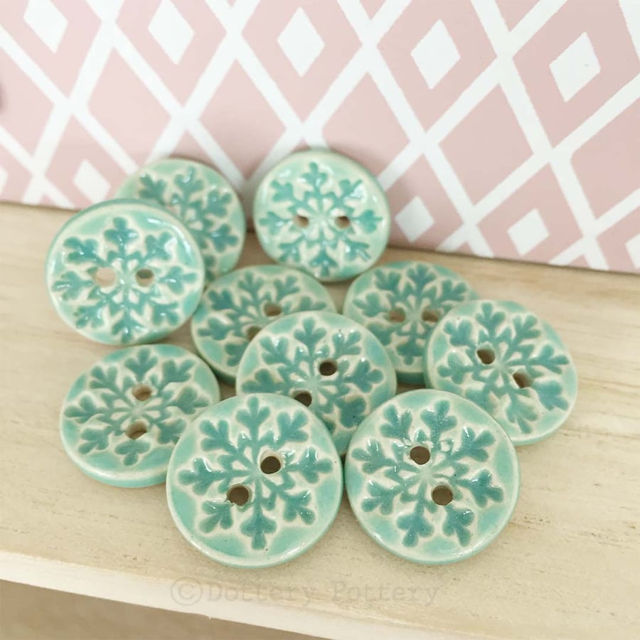 Set of ten little handmade ceramic buttons snowflake design Christmas crafts