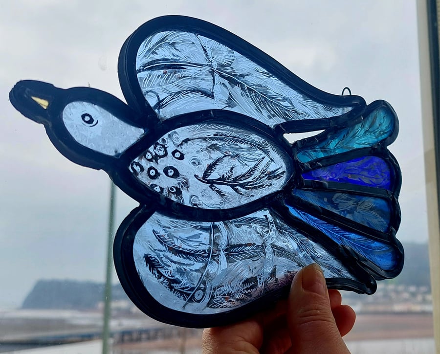 Contemporary stained glass - bird in flight 
