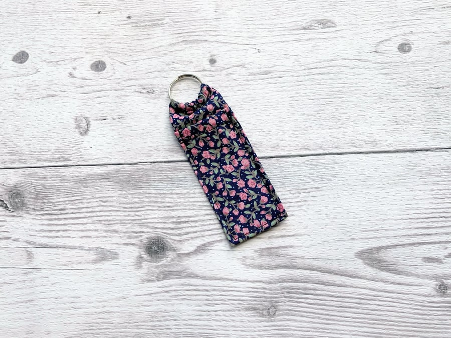 Lip balm cotton fabric keyring. Ditsy navy & pink.