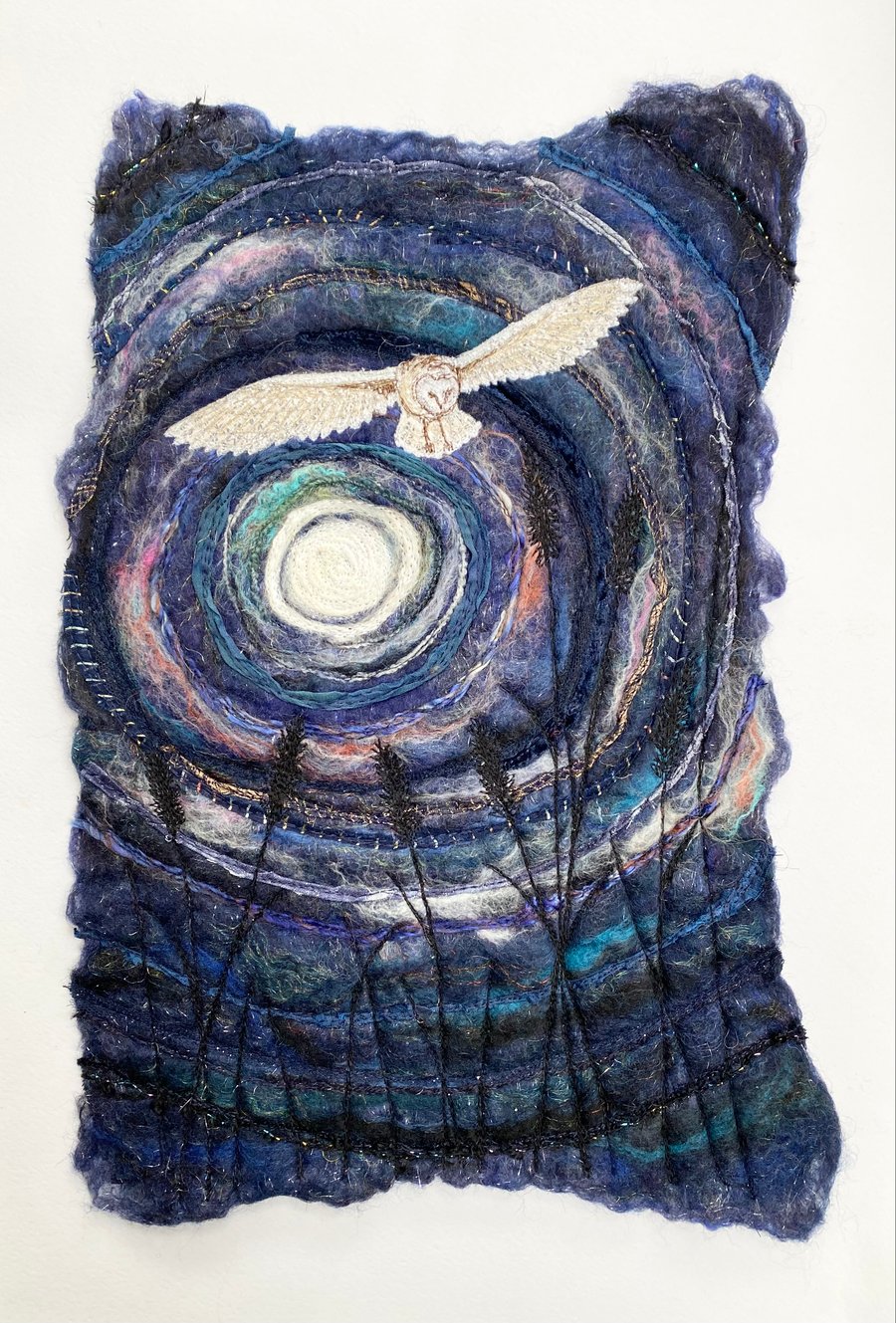 Flying barn owl, full moonlight landscape. 