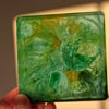 Handmade epoxy resin square coaster. Green, blue, yellow