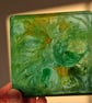 Handmade epoxy resin square coaster. Green, blue, yellow