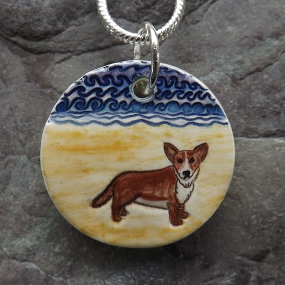 Handmade Ceramic Corgi dog on the beach pendant