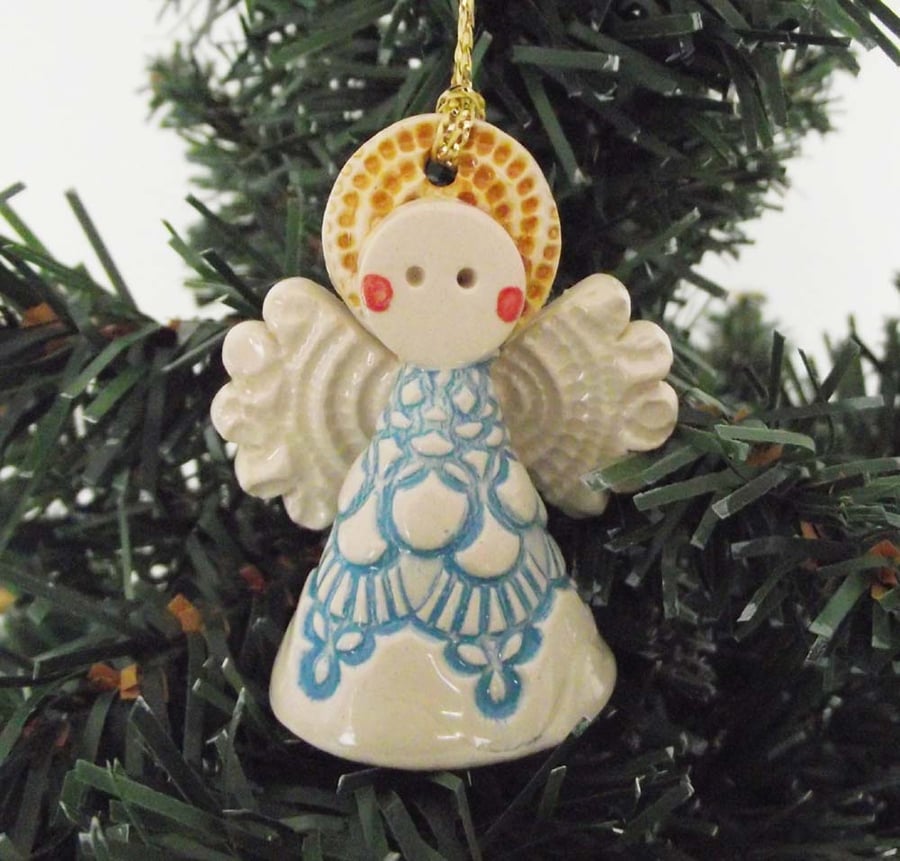 Teeny little ceramic angel Christmas decoration blue design pottery angel