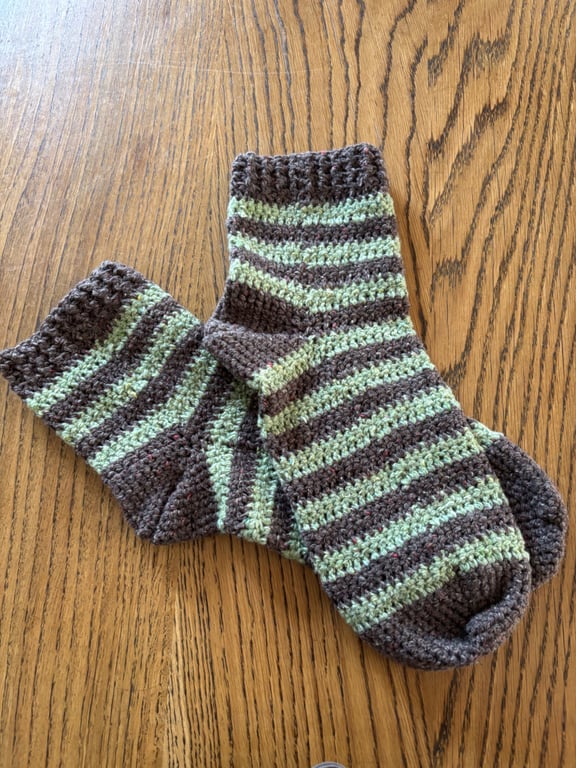 A pair of crochet green and black or slate grey stripy socks size 8-10