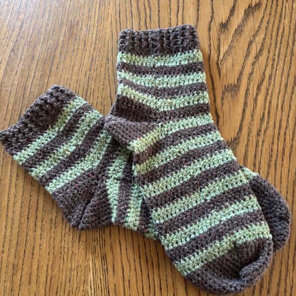 A pair of crochet green and black or slate grey stripy socks size 8-10