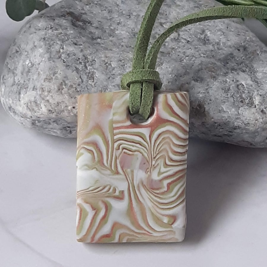 Handmade rectangular pendant in a pastel swirl polymer clay