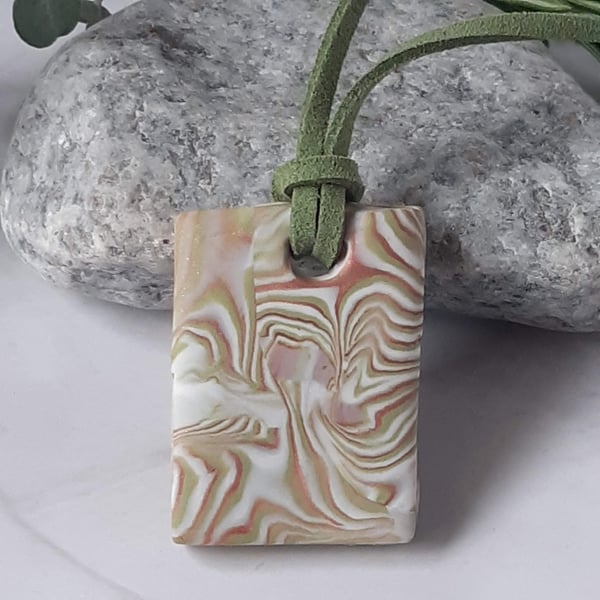 Handmade rectangular pendant in a pastel swirl polymer clay