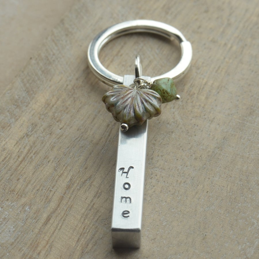 Home Aluminium Hand Stamped Bar Keyring with Czech Leaf and Bead