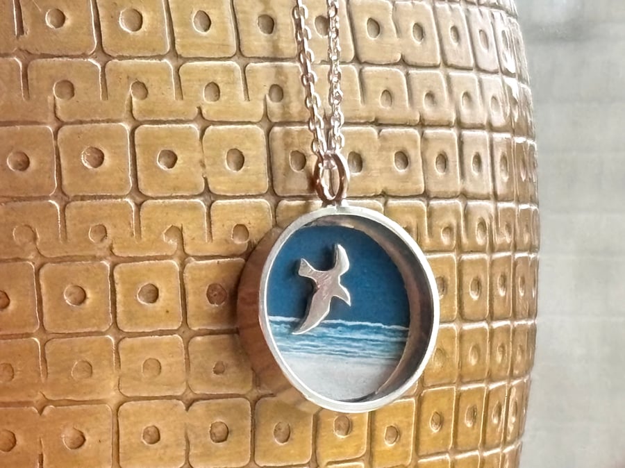Tiny seagull and sea necklace