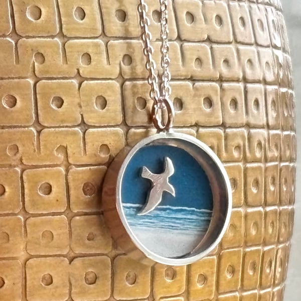 Tiny seagull and sea necklace