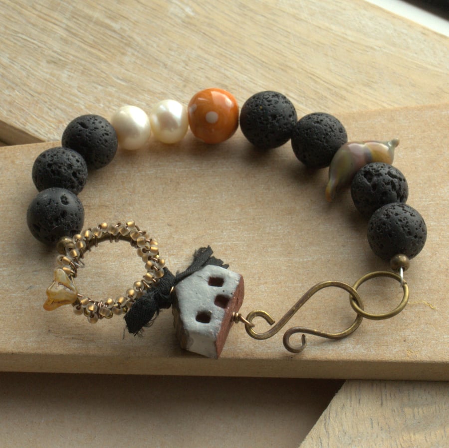 Ceramic house bracelet, Lava beads, lampwork bird, polka dot ceramic & Pearls