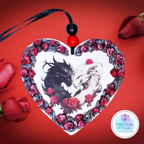 Dragon hanging hearts. Mixed media dragon hanging hearts. Dragon heart.
