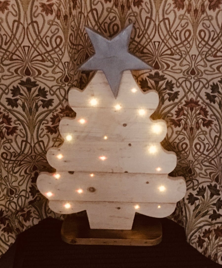 Wooden light up Christmas tree, 24 inches tall, 16 inches at widest point.