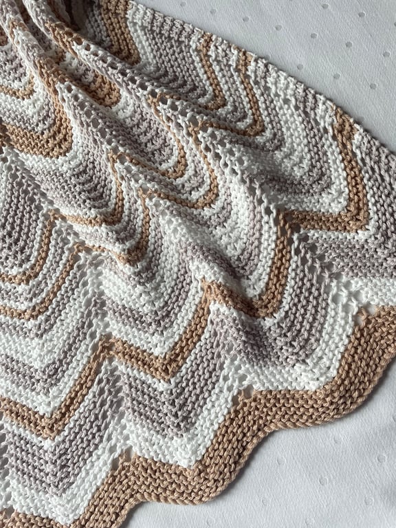 Grey, caramel and cream baby blanket in cotton mix yarn.