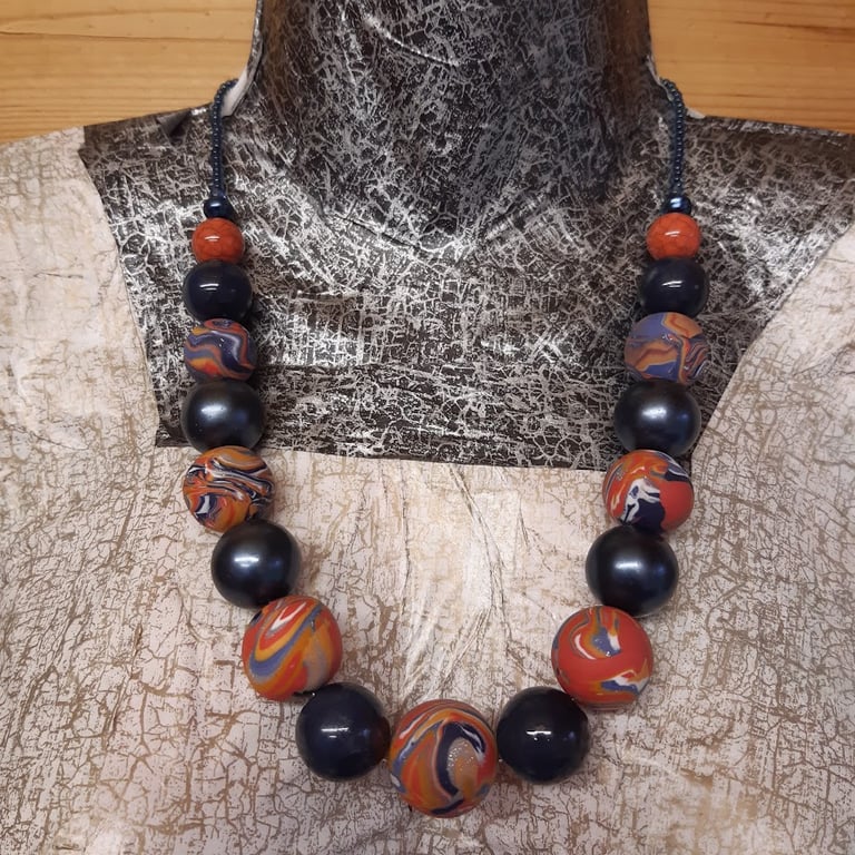 Chunky polymer clay necklace - red and blue swirl