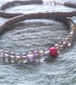 Grey and pink neckace