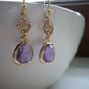 DARK LILAC AND CHAMPAGNE GOLD PLATED FANCY EARRINGS.  709