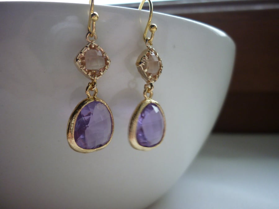 DARK LILAC AND CHAMPAGNE GOLD PLATED FANCY EARRINGS.  709