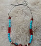 "Neo" - Tie fastening beaded necklace on thin leather cord - red & blue