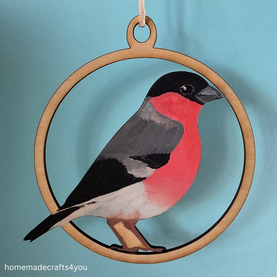 Hanging wooden decoration of a Bullfinch