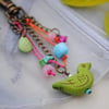 Green bird colours bag charm