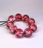 Handmade pink and white patterned lamp work glass beads - Image 4