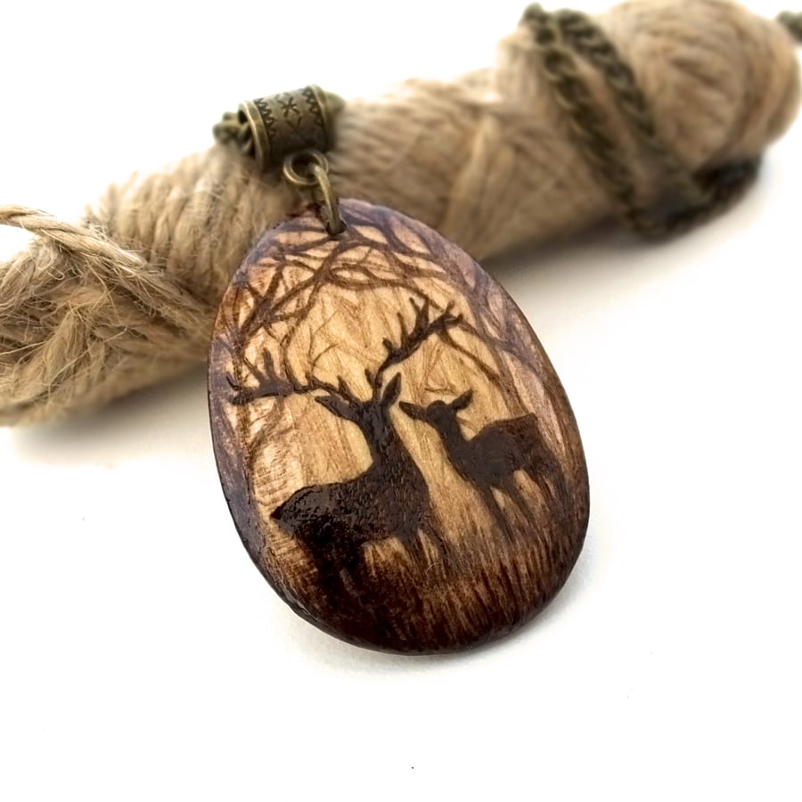 Stag and deer couple in the forest, pyrography pendant necklace