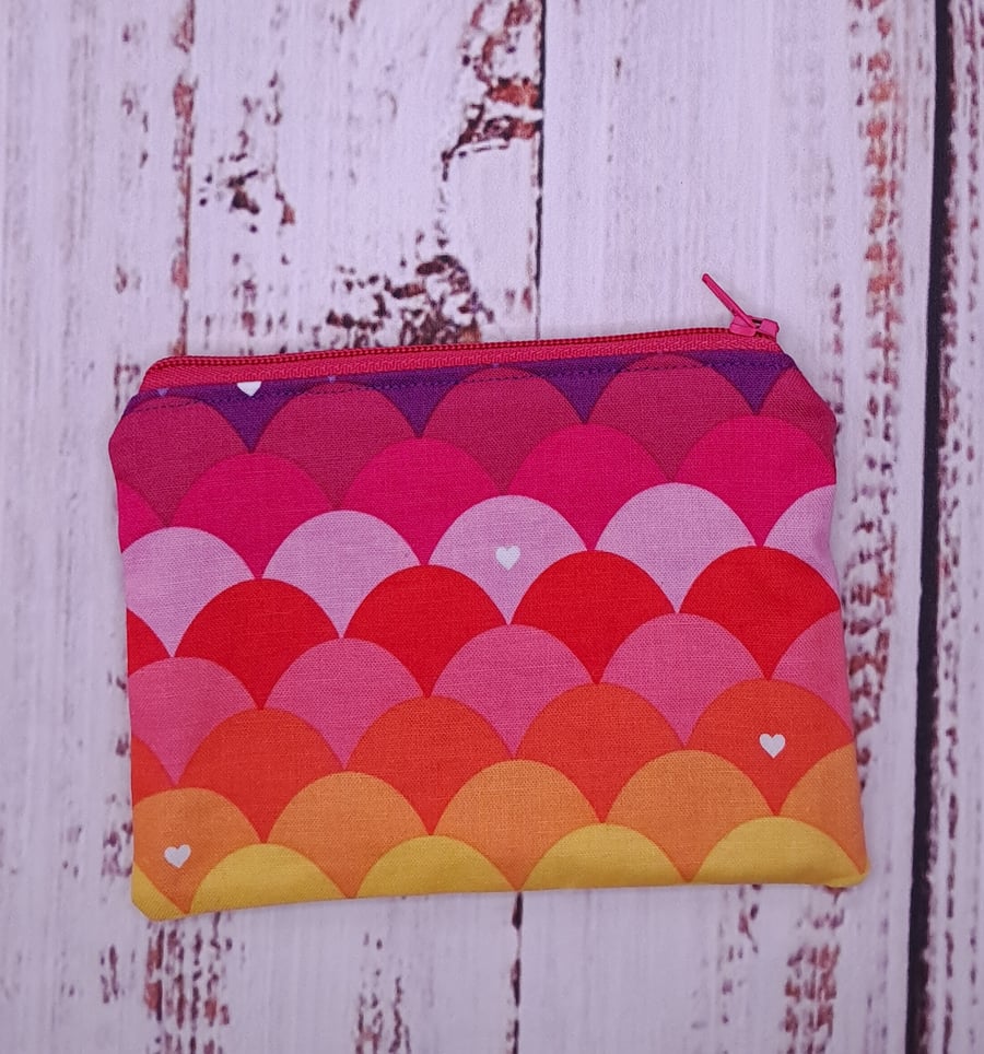 Rainbow coin zip purse with red lining
