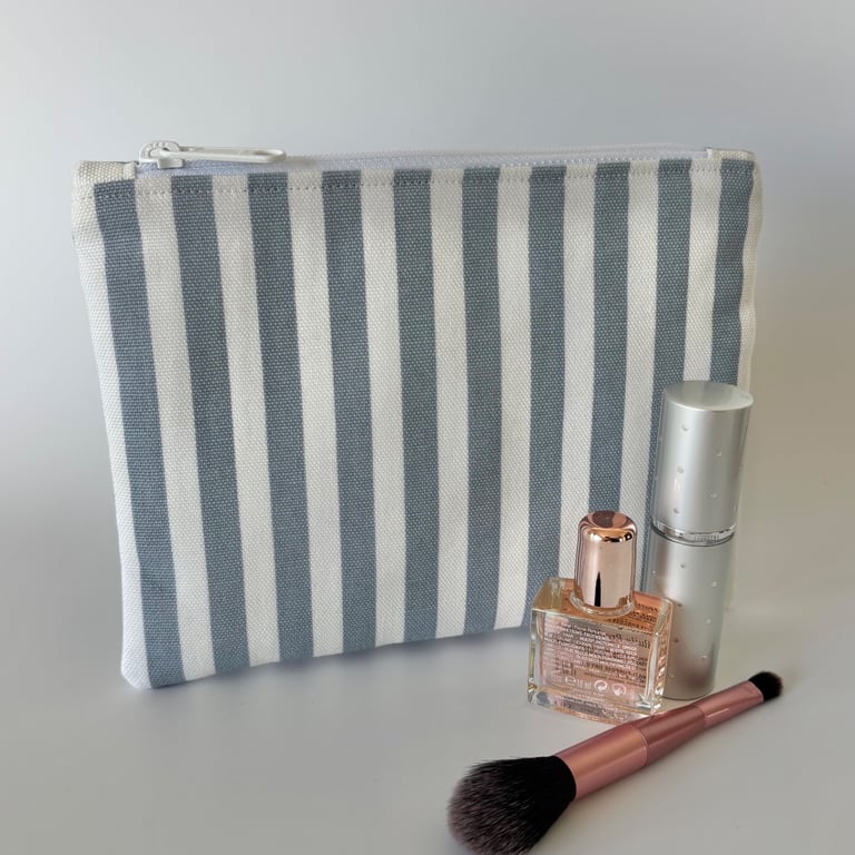 Large flat cotton zipped pouch, purse, make up bag in blue and white stripes