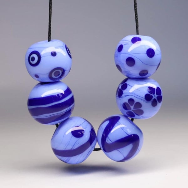 Handmade light blue and dark blue patterned lamp work glass beads