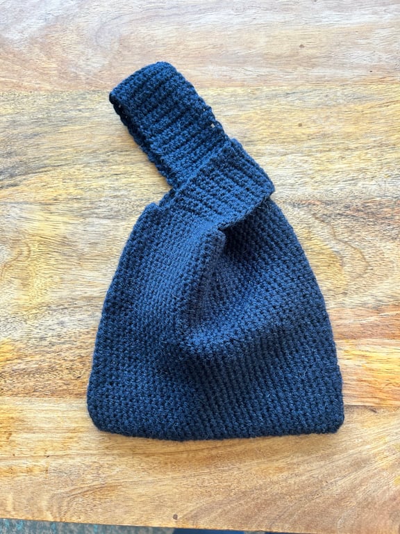 Japanese Knot Bag hand crocheted using natural yarn. 