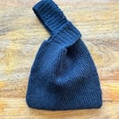 Japanese Knot Bag hand crocheted using natural yarn. 