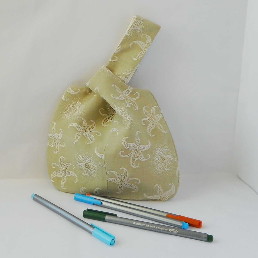 Moss green floral Japanese Knot bag in vintage fabric