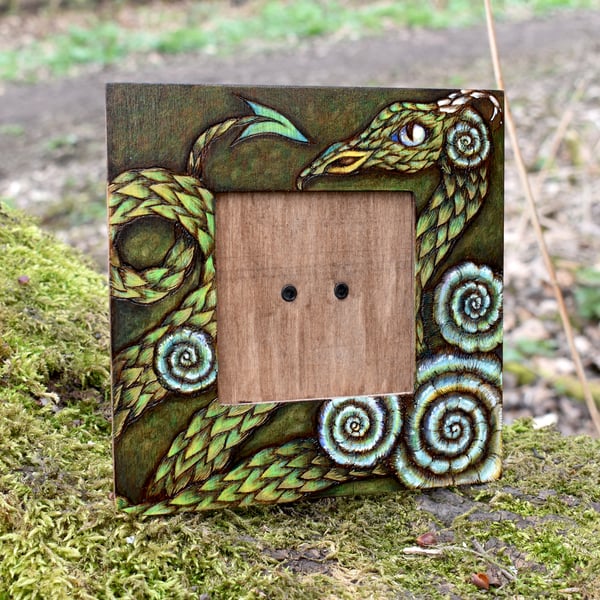 Ammonite dragon pyrography picture frame. Unique hand burned art.