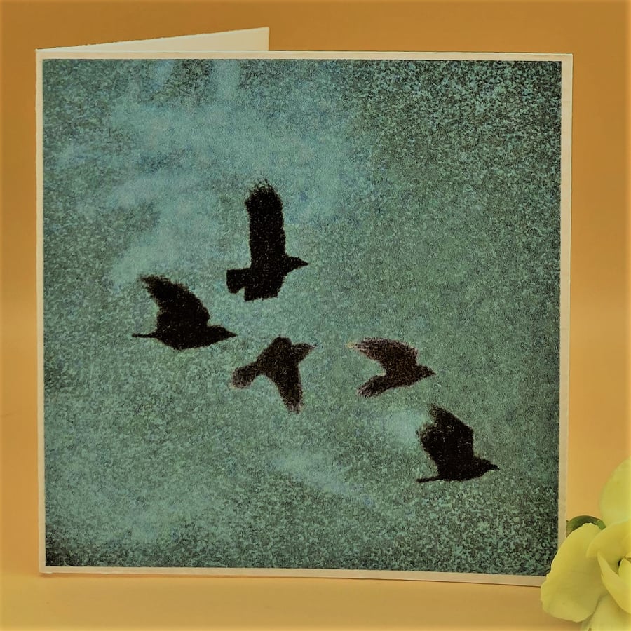 Blank Greetings Card, Crows flying in a Turquoise evening sky, no message. 