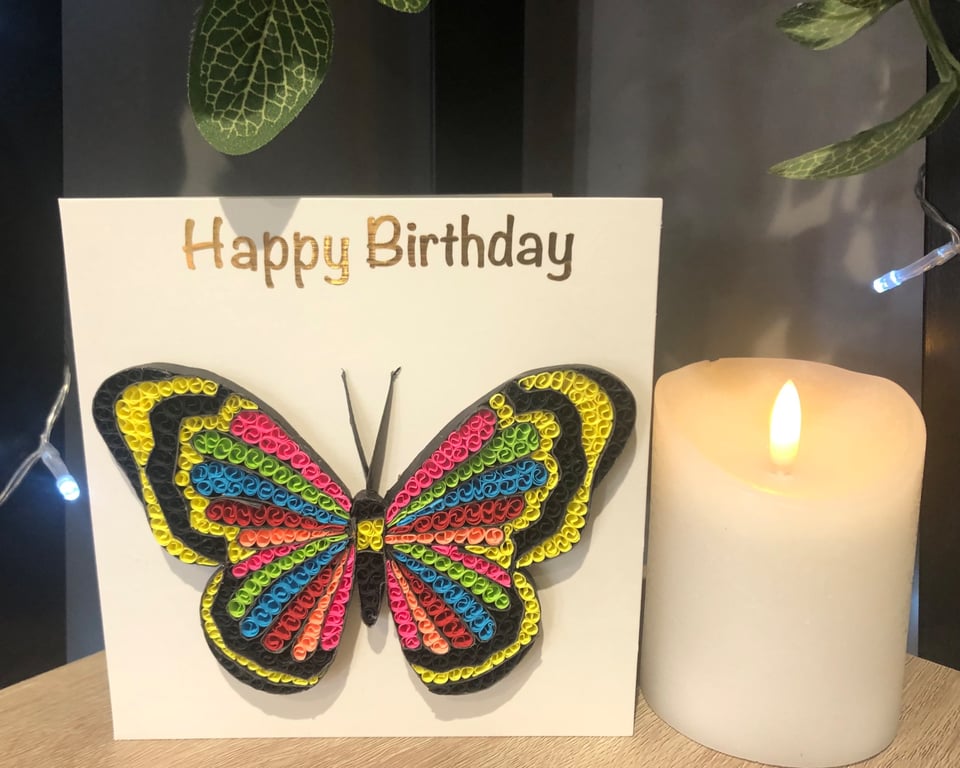 Handmade pink butterfly quilled card