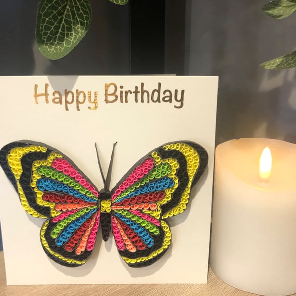 Handmade pink butterfly quilled card